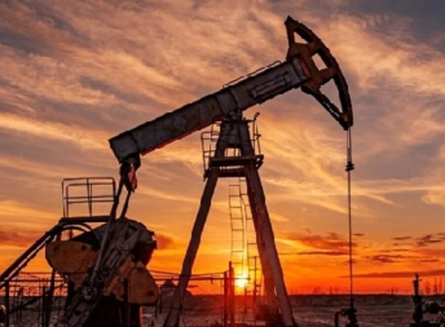 Wellhead pump at dusk